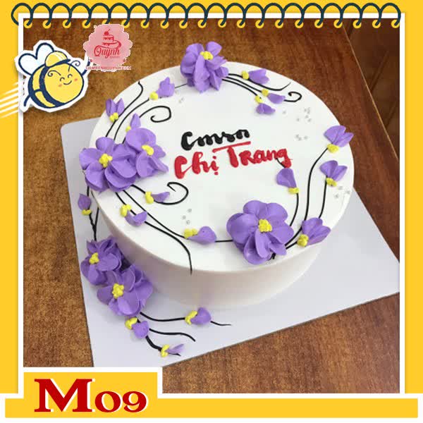 Bánh kem tặng mẹ M09 màu tím mẹ yêu những bông hoa bay lượn sống động trên nền màu trắng