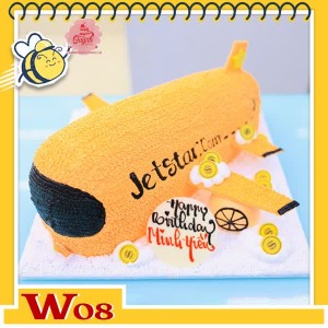Bánh kem máy bay W08 hãng Jetstar nền cam cửa sổ đen trang trí thêm đồng tiền vàng Bánh kem máy bay W08 hãng Jetstar nền cam cửa sổ đen trang trí thêm đồng tiền vàng