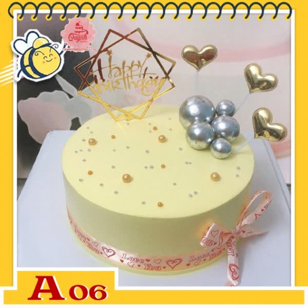 giới thiệu tổng quan Bánh kem sinh nhật đơn giản A06 nền màu vàng cắm phụ kiện thắt nơ dịu dàng