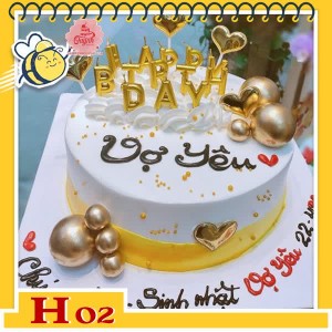 Bánh kem tặng người yêu H02 màu vàng trắng cắm phụ kiện nến và bi sang trọng Bánh kem tặng người yêu H02 màu vàng trắng cắm phụ kiện nến và bi sang trọng